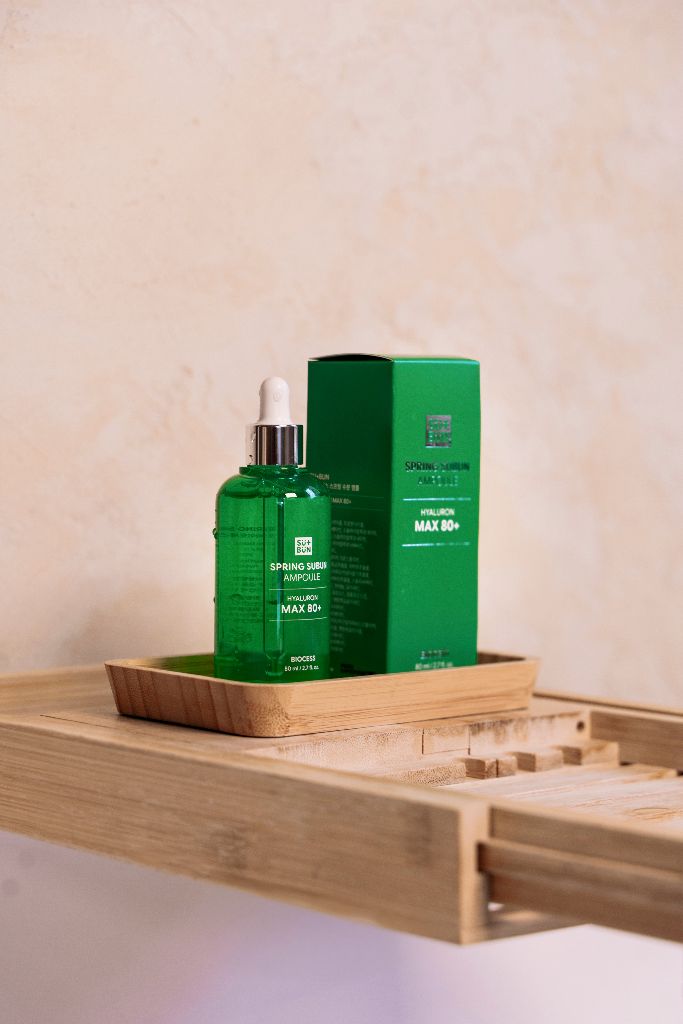Spring Subun Ampoule with box on wooden shelf